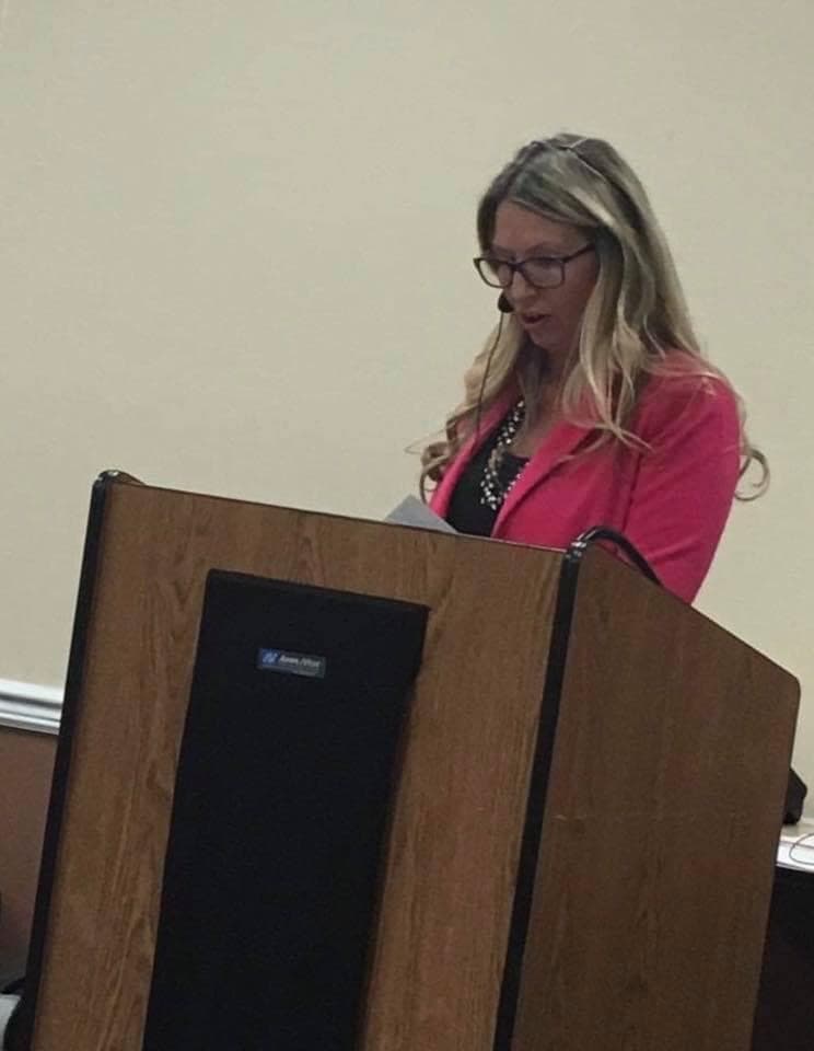 Chelsa Meadus speaking at a community event